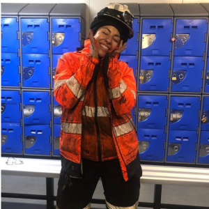 women in mining, ladies hi vis orange and navy jacket and orange hi vis vest